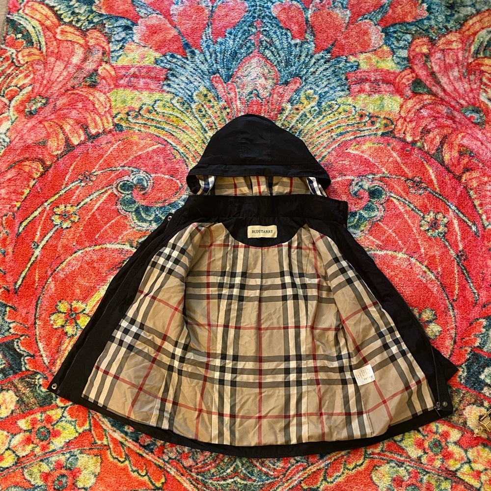 Black and tan and red plaid lined jacket, water resistant
